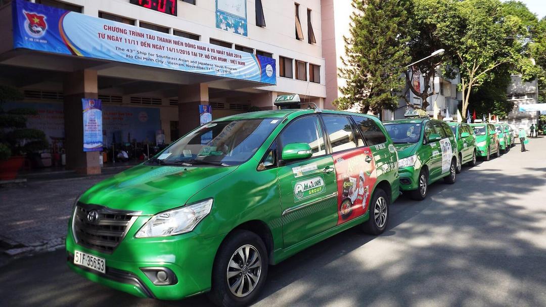 A clean, modern taxi lined up ready to depart - an ideal private car option for a Saigon-to-Ben Tre journey