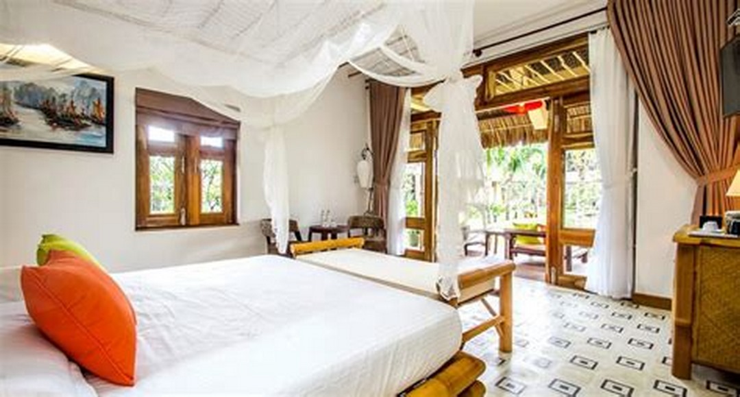 Cozy boutique room with natural light at The Island Lodge