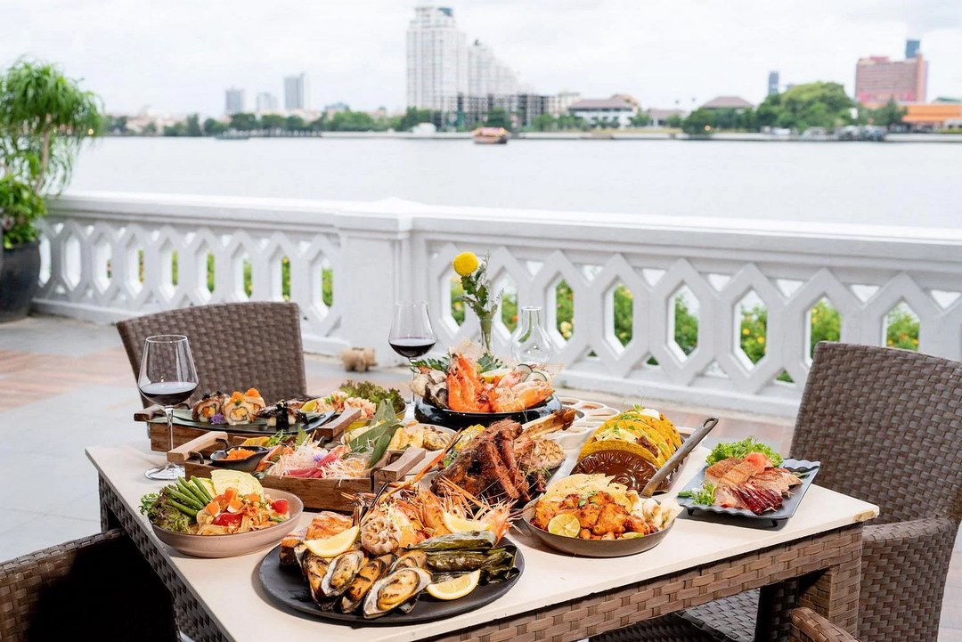 Riverside dining with open views of the Mekong—breezy terrace by the water